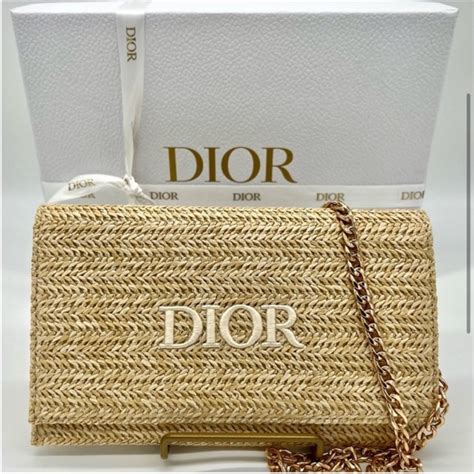 dior raffia clutch free gift|dior caro cannage bag.